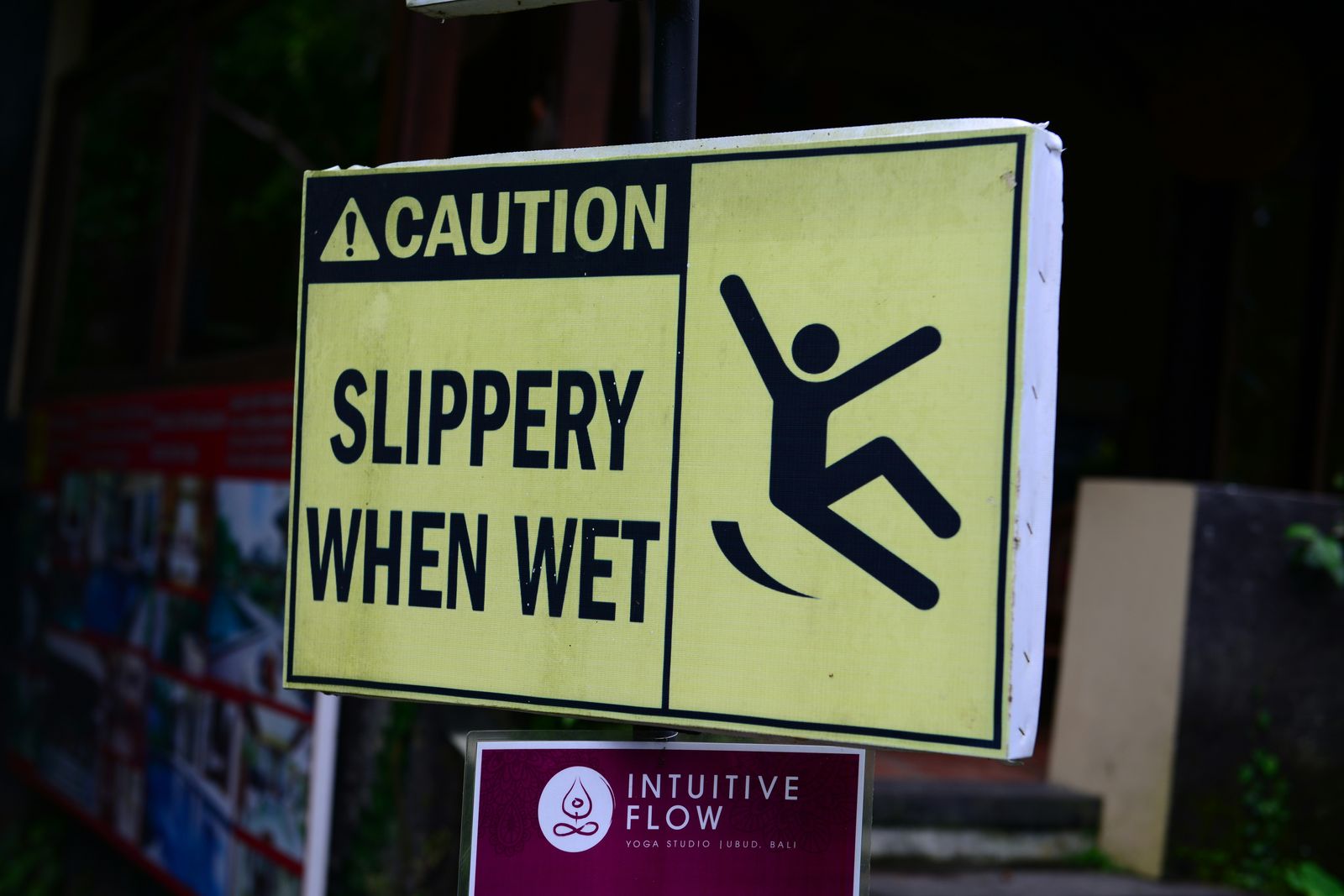 Slippery when wet warning sign
